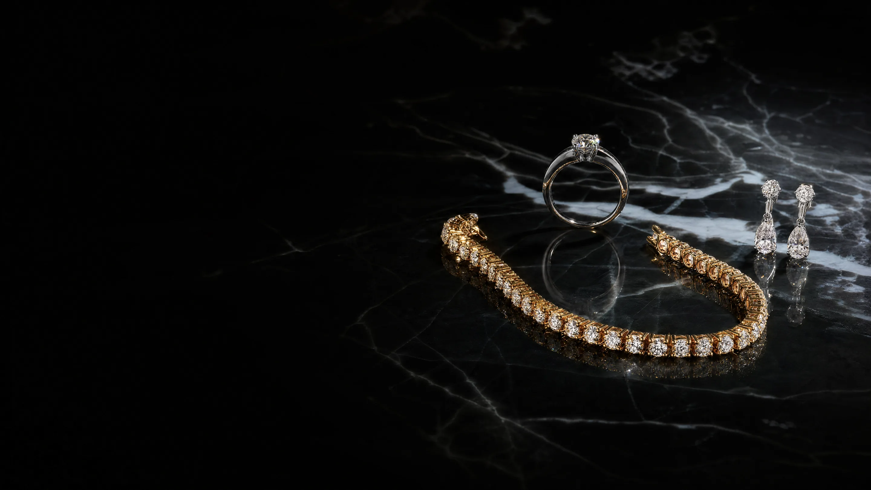 A diamond tennis bracelet, solitaire ring and drop earrings on black marble under one light (illustrative, generated)